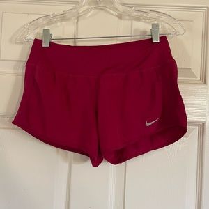 Nike Dri-Fit running shorts with built in panties and draw string. Size S.